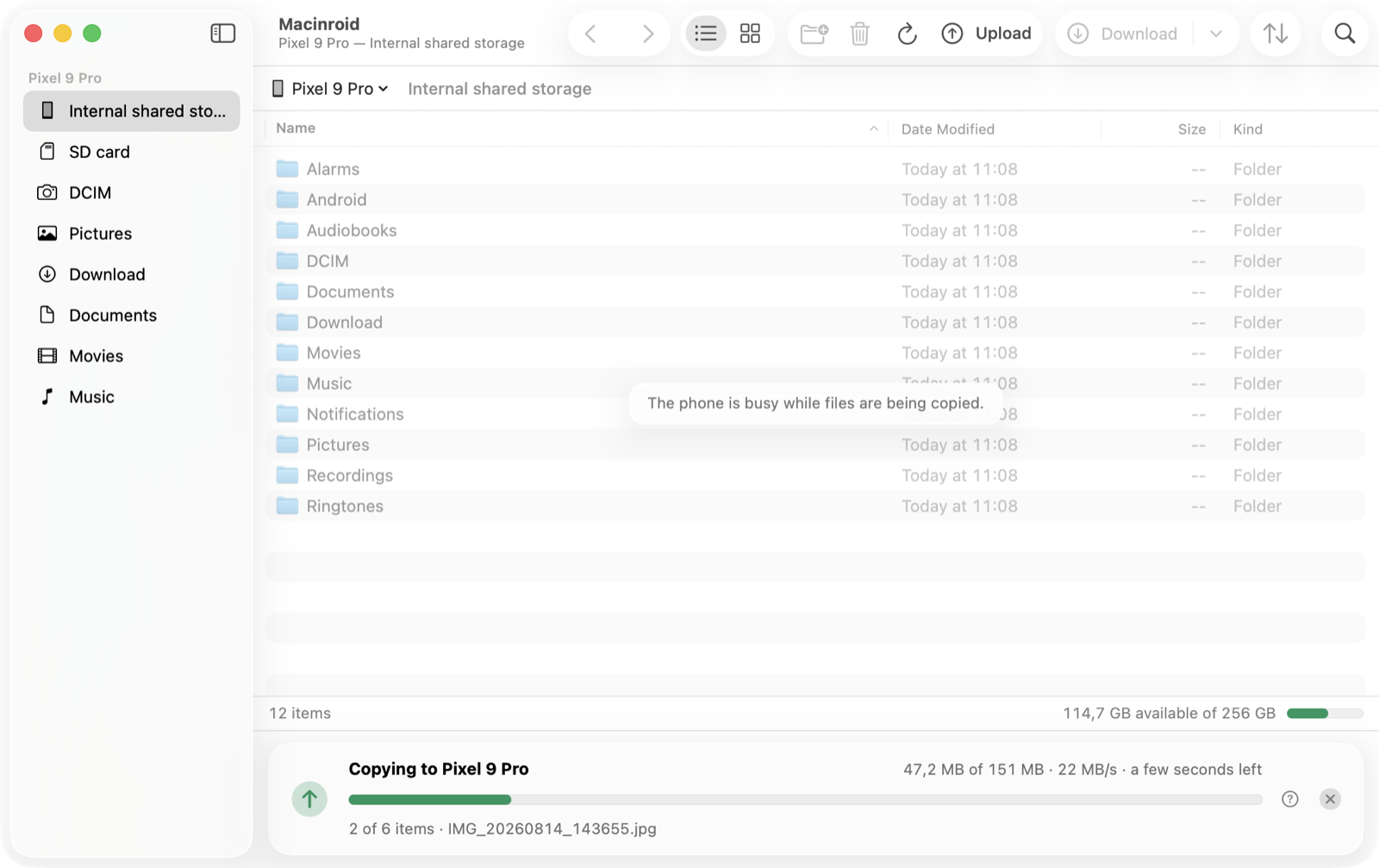 A copy to the phone in progress: 47 MB of 151 MB at 22 MB/s, with a few seconds left and a button to cancel